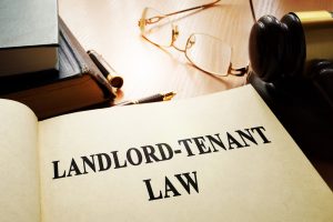 landlord-tenant law on an office table